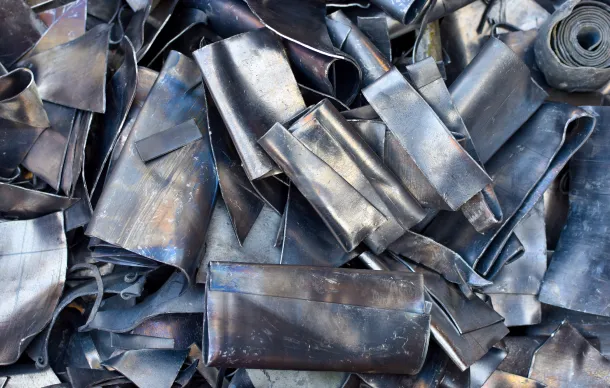 Close-up of metal scraps, highlighting the recovery process of precious metals.
